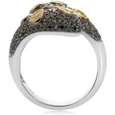 Explore the epitome of elegance with our Black & Yellow Diamond Fashion Ring from Roman & Jules. Crafted in 18K gold, this ring is a celebration of individuality and style. It's designed for the woman who wants to express herself with a piece that's as unique as she is.In this mesmerizing ring, you'll find pear-shaped yellow diamonds, totaling 0.73 carats, set within a sea of enchanting black diamonds, totaling 0.94 carats. The contrast between these two diamond colors creates a captivating and Luxury Diamond Ring With Accents, Formal Sapphire Ring With Pave Setting, Luxury Oval Sapphire Ring With Pave Setting, Luxury Diamond Cut Diamond Ring, Luxury White Gold Diamond Snake Ring, Luxury Diamond Cut Diamond Ring For Evening, Luxury Diamond Cut Ring For Evening, Luxury Brilliant Cut Diamond Ring For Evening, Luxury Formal Diamond Ring With Single Cut Diamonds