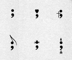 the symbols are drawn in black ink on white paper