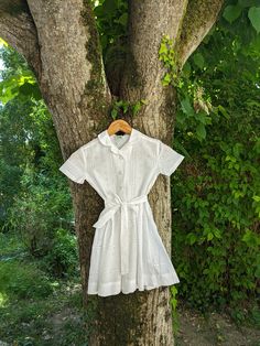 🌿Mid Century Children's Clothing  Size: length of dress 65cm.  Armpit to armpit 35cm Suitable for age 5 or 6 I believe  Condition: good vintage, no stains or repair work, minimal signs of previous wear Origin: France circa 1950s/60s Knee length, children's English embroidery dress. White cotton dress with buttons, collar and Belt. Beautiful summer dress, sourced and made in France circa 1960s. A timeless outfit for a lovely little girl! White Belted Dress For Garden Party, White Vintage Dress With Short Sleeves For Summer, White Vintage Dress With Short Sleeves For Garden Party, White Vintage Dress For Garden Party With Short Sleeves, White Short Sleeve Vintage Dress For Summer, White Short Sleeve Vintage Dress For Garden Party, Summer White Vintage Dress With Short Sleeves, White Short Sleeve Vintage Summer Dress, Summer Vintage Dress In White For Daywear