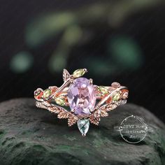 Art Deco Oval Lavender Amethyst engagement ring Bridal Set Rose Gold Unique Leaf Nature Inspired  Gemstone Promise Cluster ring jewelry Gift (Please comfirm your US size when you make an order) Jewelry details: Matal Type: 14k gold /18k gold Engagement Ring: Center Stone: Lavender Amethyst Stone Size: 6*8mm Side stones: peridot Total weight: 0.18ctw (High Quality) Wedding band Moss Agate and moissanite Carat Weight: approx. 0.182ctw Or: black sapphire (If you choose side stone in black sapphire) Amethyst And Peridot Ring, Lilac Engagement Ring, Lavender Sapphire Engagement Ring, Magical Rings, 18k Gold Engagement Ring, Amethyst Engagement Ring, Lavender Amethyst, Amethyst Ring Engagement, Cute Engagement Rings