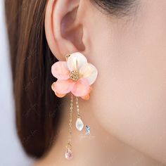 These elegant pink flower fashion earrings features a cute big pink flower and a long tail as back piece that you can wear with or without it. Add these cute flower fashion statement earrings to your everyday fashion earrings collection or as gift for your love one. Jewelry Care: See more information about how to care for your jewelry here. Shipping Policy: Orders will be shipped within 1-3 business days. Economy shipping will take 7-14 days to arrive and standard shipping is 1- 4 days for U.S. Trendy Wedding Flower Drop Earrings, Dangle Flower Earrings With 3d Flowers, Trendy Flower Earrings For Wedding, Trendy Flower-shaped Earrings For Wedding, Trendy Pink Flower Earrings, Pink Jewelry With 3d Flowers For Party, Pink Feminine Dangle Flower Earrings, Feminine Pink Dangle Flower Earrings, Pink Feminine Flower Dangle Earrings