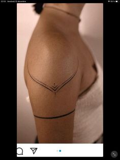 a woman's shoulder with a line drawing on it