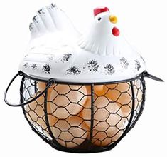 an egg basket with eggs in it and a chicken sitting on top of the bowl