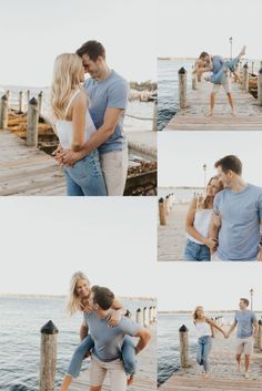 a man and woman standing on a dock next to the ocean with their arms around each other