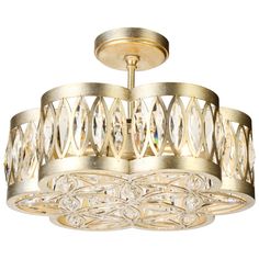 a gold chandelier with crystal drops