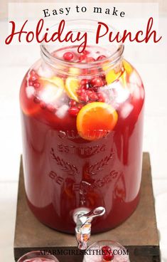 a mason jar filled with cranberry punch