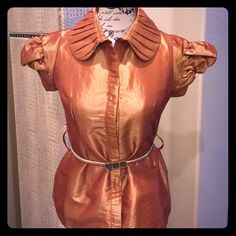 Brand New. Peach Metallic Gold Top. Its A Botique Brand. Fitted Elegant Orange Blouse, Elegant Fitted Orange Blouse, Gold Fitted Collared Blouse, Chic Orange Fitted Blouse, Chic Fitted Orange Blouse, Fitted Orange Party Blouse, Fitted Orange Blouse For Party, Gold Top, Metallic Gold