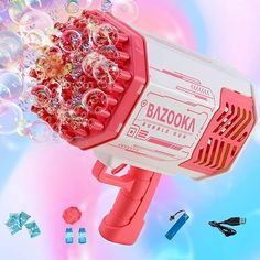 a pink blow dryer with lots of bubbles on it and other items surrounding it