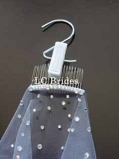 a hair comb is attached to a net