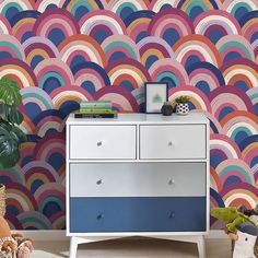 A quirky and bright rainbow motif to bring joy to any space. Ideal for kids bedrooms a nursery or a play room. Branded Wallpaper, Wallpaper Vibrant, Walker Wallpaper, Next Wallpaper, Jungle Wall, Mulberry Home, Bright Wallpaper, Mini Moderns, Nina Campbell