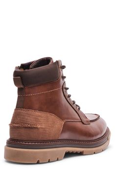 Enjoy the rugged durability of this classic boot constructed with a moc-stitched toe, padded collar and lugged sole. Synthetic upper/textile lining/rubber sole Imported Lug Sole Boots, Classic Boots, Lug Sole, Cognac, Boots Men, Nordstrom Rack, Rubber Sole, Size 7, Nordstrom