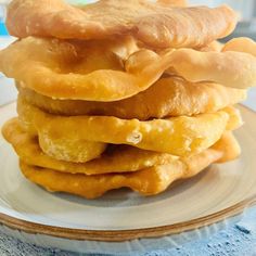 a stack of food sitting on top of a white plate