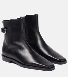 The Belted leather ankle boots in black - Toteme | Mytheresa Calf Leather Heeled Boots With Square Toe, Elegant Square Toe Chelsea Boots For Workwear, Elegant Square Toe Chelsea Boots For Work, Leather Square Toe Chelsea Boots, Chic Leather Chelsea Boots With Square Toe, Leather Square Toe Heeled Boots For Office, Modern Boots With Leather Lining And Square Toe, Modern Boots With Square Toe And Leather Lining, Modern Square Toe Boots With Leather Lining