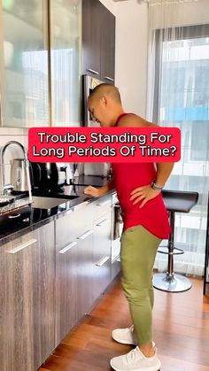 a man standing in front of a kitchen counter with the words trouble standing for long periods of time?