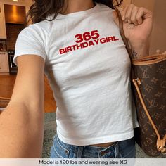 "365 Birthday Girl" Graphic Slogan Printed On Aesthetic Retro Vintage 90s Y2k Baby Tee Shirt with our own unique font.  🎨 Available in White, Light Pink, Light Blue, Navy, Black. If you need a different color, please let us know! (Ash, Red, Sport Grey & Green)  🎁 Our baby tees are perfect gift for her or him offering timeless fashion and versatility that anyone will cherish. Baby tees, popular in the '90s, have short sleeves and a slightly cropped body, giving a flattering feminine shape. They originated in the skater/raver scene and were part of the era's child-like fashion trend. 🧵 Features : ‣ 90s baby tee style (for adults) ‣ 100% cotton ‣ Double-needle stitched neckline ‣ Seamless collar ‣ Classic fit ‣ True to size (see size chart) ‣ Y2K vintage streetwear fashion 📏 Sizing : Mode Elle Aesthetic, Baby Tee Shirt, Baby Tee Shirts, Girl Y2k, Streetwear Mode, Baby Tees Y2k, 90s Baby, Y2k Baby Tee, Baby Tees