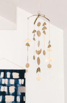 a wind chime hanging from the ceiling in a room