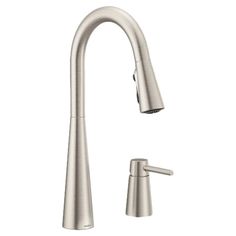 a kitchen faucet with two handles and nozzles on the side, in stainless