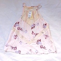 Nwt Light Pink Flowy Tank Top With Halter Neck Line And Ivory Lace Insets. Burgundy Floral Print Slightly Cropped Super Cute Summertime Top Smoke Free Home Pink Cotton Cami Top, Pink Cotton Tank Top For Daywear, Pink Feminine Tank Top With Lace Trim, Feminine Pink Tank Top With Lace Trim, Cute Pink Cami Tank Top, Pink Floral Print Cami Top, Pink Floral Print Tank Top For Day Out, Pink Feminine Tops With Lace Trim, Spring Pink Cami Tank Top