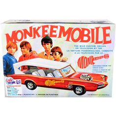 an advertisement for the monkiemobile, featuring three young men and a red car