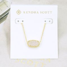 Nwt Kendra Scott Elisa Drusy Necklace. Please Note Due To Natural Stone, None Of Drusy Stone Will Be The Same, The Color Will Be Lighter Or Darker, Spikes Will Be Bigger Or Smaller, Etc. I Will Not Accept Offers Of Bundle Deals, A 15% Discount Will Apply Automatically. White Iridescent Drusy Chain: 15" + 2" Extension; Pendant: 1" X 3/8" Gold Plated / Lobster Clasp Brand New With Card And Pouch, No Gift Box. Please Check My Store For Other Colors And Styles!! Kendra Scott Necklace Iridescent Drusy, Kinda Scott Necklace, Kender Scott Necklaces, White Kendra Scott Necklace, Kendra Scott Necklace White, Kendra Scot, Kendra Scott Elisa Necklace, White Stone Necklace, Preppy Necklaces