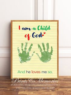 a sign that says i am a child of god and he loves me so