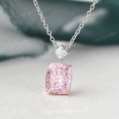 5ct Pink Simulated Diamond Necklace Cushion Pink CZ Two Stones White Gold Princess Cut Pendant Bridesmaid Necklace Anniversary Gift For Her Jewelry Details: * Center Stone: Pink Cubic Zirconia (Simulated Diamond) * Measures: 5ct * Accent Stone: Colorless Cubic Zirconia (Simulated Diamond) * Color: white gold as the picture, rose gold and yellow gold ( both chain and pendant ) * Metal Type: Solid 14k yellow gold, rose gold, white gold (Platinum, 10K or 18K metal upgrade, upon request) * Eco Frien Luxury Rose Gold Diamond Necklace With Gemstone, Rose Gold Solitaire Necklace For Wedding, Formal Pink Diamond Cut Necklaces, Wedding Solitaire Necklace With Gemstone, Pink Necklaces With Prong Setting For Gifts, Silver Cubic Zirconia Necklace For Bridesmaid, Pink Clavicle Chain Jewelry For Anniversary, Pink Clavicle Chain Necklace For Anniversary, Pink Necklace With Prong Setting For Formal Occasions