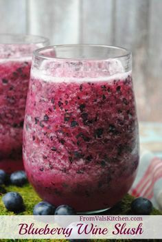 two glasses filled with blueberry wine slush