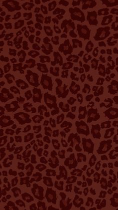 an animal print pattern in red and brown