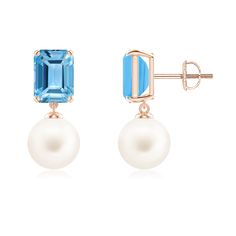 Emerald-cut Swiss blue topazes and Freshwater cultured pearls come together on these stylish drop earrings. The prong-set tropical blue gems strike a fascinating contrast with the Freshwater pearls. Set in 14k rose gold, these pearl drop earrings look beyond charming. Tropical Blue, Blue Topaz Earrings, Freshwater Pearls Earrings, Topaz Earrings, Blue Gems, Swiss Blue Topaz, Freshwater Cultured Pearls, Pearl Drop Earrings, Pearl Drop