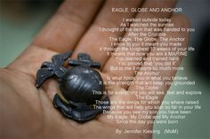 a hand holding a tiny turtle ring with an poem written in it's center