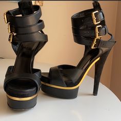 Gucci Gladiator Platform Sandals. Size 36.5 Black Leather, Black Sued, Gold Detailing. Excellent Condition. Gucci Ankle Strap Leather Sandals, Gucci Ankle Strap Sandals With Buckle, Gucci Ankle Strap Sandals With Buckle Closure, Chic Gucci Sandals With Buckle Closure, Gucci Party Heels With Buckle Closure, Designer Heels With Buckle Closure For Night Out, Gucci Platform Sandals With Ankle Strap, Gucci Round Toe Heels With Buckle Closure, Gucci Black Leather Sandals