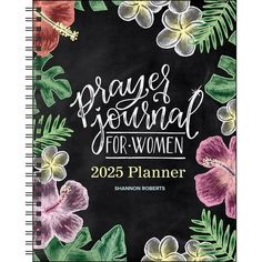 a spiral notebook with flowers and leaves on it, which reads pray journal for women