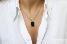 "A Black Onyx necklace is a true embodiment of sophistication and elegance. This gem necklace is handcrafted in 14k gold and features a rectangular Black Onyx gemstone in prongs. Everything about this yellow gold necklace is to love - it is versatile and totally wearable from day until evening. ♥ Gemstone Type - Black Onyx ♥ Gemstone Size - 13x18mm ♥ Gemstone Cut - Rectangle - More options available in the drop down menu ♥ Metal Type (Main Photo) - 14k Gold Filled - More options available in the Minimalist Everyday Jewelry With Rectangular Stone, Everyday Minimalist Jewelry With Rectangular Stone, Gold Jewelry With Rectangular Stone For Formal Occasions, Gold Jewelry With Rectangular Stone For Formal Events, Formal Gold Jewelry With Rectangular Stone, Everyday Jewelry With Rectangular Gemstone Pendant, Gold Oblong Gemstone Jewelry, Modern Formal Necklace With Rectangular Pendant, Gold Jewelry With Rectangular Stone For Gift