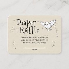 a paper raffle card with an owl and stars design on the front, which reads diaper raffe