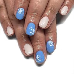 15 Short Winter Nail Ideas for 2023-2024 - thepinkgoose.com Snow Flake Nails Christmas, Simple Winter Nails Short Blue, Snow Flake Nails Short, Blue Snowflake Nails Short, Blue Christmas Nails Short, Snow Flakes Nails, Winter Nails Diy, Short Winter Nail Ideas, Snow Flake Nail Art