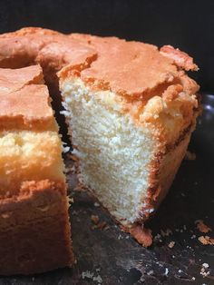 a close up of a cake with one slice missing