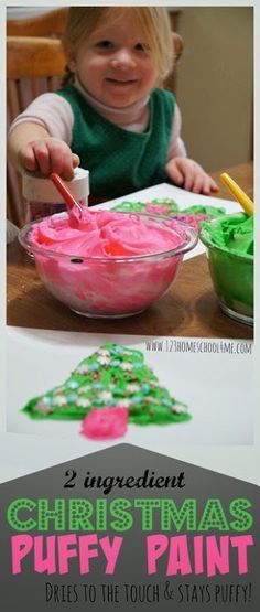 a young child is making christmas crafts with pink and green paint