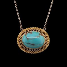 This is part of Chairish’s Fine Jewelry assortment.  A fine repurposed Victorian period 14K gold pendant with a natural polished turquoise in the center.  The bezel set stone is surrounded by a gold filigree frame.  The chain is marked 14K and is the adjustable type which allows you to wear it two inches shorter.  Condition is excellent.  The back of the pendant also has an applied small plaque stamped 14K.  It dates c. 1890.  Dimensions: 18" or 16", Pendant: Width: 1", Length: 3/4", Weight:  5. Gold Oval Turquoise Gemstone Necklace, Elegant Gold Turquoise Necklace With Oval Pendant, Gold Turquoise Pendant Necklace With Cabochon, Elegant Oval Turquoise Necklace With Large Pendant, Victorian Turquoise Filigree Jewelry, Elegant Yellow Gold Turquoise Necklace With Cabochon, Elegant Yellow Gold Turquoise Cabochon Necklace, Antique Oval Turquoise Necklace, Antique Turquoise Oval Necklace