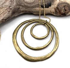 Our beautiful bronze circles pendant is suspended from a delicate 14kt Gold Filled ball chain. This is a unique anniversary gift or just a lovely piece to add to your wardrobe. Our antique bronze is heavily plated over stainless steel, which takes copper out of the process, for those of you worried about copper allergies. Bronze is the traditional metal for the 8th and 19th anniversary. 19th Anniversary Gifts, 19th Anniversary, Bronze Anniversary, Bronze Gifts, Circle Chain, Anniversary Necklace, Unique Anniversary Gifts, Metal Circle, Bronze Jewelry