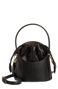 A dipped topline and oval cutout showcase the encased drawstring pouch of this structured leather bucket bag furnished with a top handle and removable strap Drawstring closure Top carry handle; removable, adjustable crossbody strap Structured silhouette with flat base and protective metal feet Striped twill lining Leather Made in Italy Designer Handbags Modern Evening Crossbody Bucket Bag, Evening Crossbody Bucket Bag With Detachable Handle, Evening Bucket Bag With Detachable Handle Crossbody, Chic Evening Bucket Bag With Leather Handles, Modern Bucket Bag With Adjustable Strap For Evening, Black Bucket Bag With Handle Drop For Evening, Chic Evening Bucket Bag With Handle Drop, Designer Crossbody Bucket Bag With Detachable Handle, Formal Bucket Bag With Removable Pouch And Top Handle