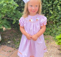 Free Shipping when you spend $80 or more. Use code FREESHIP80 at checkout. This listing is for the dress only. We have bows and cardigans listed separately.  https://www.etsy.com/PleatsAndStitches/listing/651028788/6-inch-grosgrain-bow-white-red-green?utm_source=Copy&utm_medium=ListingManager&utm_campaign=Share&utm_term=so.lmsm&share_time=1661342827024 https://www.etsy.com/PleatsAndStitches/listing/822411104/white-ruffle-cardigan-cotton?utm_source=Copy&utm_medium=ListingManager&utm_campaign=Share&utm_term=so.lmsm&share_time=1661342845718 Sizing Our dresses & pajamas run big ... long to be exact!    Bishops are designed to be ankle length if ordering current size. You may want to order a size down for sizes 4 and below and check out our size chart (in the pictures) if you are unsure.  Sign Playful Short Sleeve Dress With Smocked Bodice, Playful Fitted Dress For Fall, Playful Spring Costume Dresses, Fitted Short Sleeve Easter Dresses, Fitted Short Sleeve Dresses For Easter, Purple Costume Dress For Spring, Pink Short Sleeve Halloween Dress, Pink Short Sleeve Dress For Halloween, Cute Purple Halloween Dress