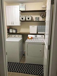 a washer and dryer in a small room