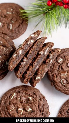 chocolate cookies are stacked on top of each other