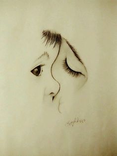 a drawing of a child's face with long eyelashes