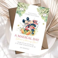 a card with an image of mickey and minnie mouse on it