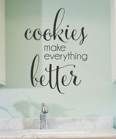 there is a wall sticker that says cookies make everything better on the kitchen counter