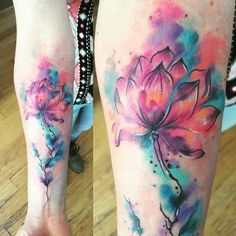 a woman's legs with watercolor tattoos and flowers on her leg, both painted in different colors