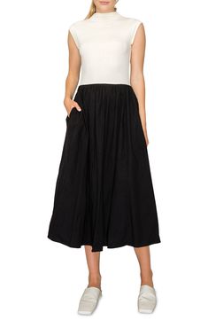 Build out your black-and-white collection with a mixed-media midi that achieves a two-piece look with one-and-done ease. 49 1/2" length Funnel neck Sleeveless Side-seam pockets Bodice is 67% rayon, 27% Tencel® lyocell, 6% spandex; skirt is 55% polyester, 45% rayon Tencel lyocell is a more-sustainably produced fiber made with closed-loop processing Dry clean or hand wash, dry flat Imported Sleeveless Midi Dress, Midi Dress Sleeveless, Fabric Gifts, Free Fabric, Anniversary Sale, Funnel Neck, Black Fits, Nordstrom Dresses, Funnel