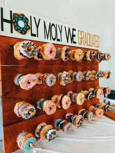 Donut Display Graduation, Donut Wall For Graduation Party, Graduation Donut Bar, Graduation Donut Wall, Farm Graduation Party, Donut Board Graduation, Donut Bar Graduation Party, Donut Wall Graduation Party