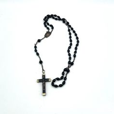 "Another beautiful rosary from a local estate. This vintage rosary is made of black beads.  It has silver tone crucifix and medallion.  It is marked France. It measures about 26\" long.  The drop is from the medallion to the end of the cross is 7 1/4\". It is in good condition. I am always happy to answer questions or to provide additional photos. Thanks so much for stopping by my shop The Misadventures of Jo. I hope you will follow my shop and join my misadventures. https://www.themisadventuresofjo.com" Vintage Rosary, Vintage Jewels, Dallas Tx, Black Beads, Rosary, Made In France, Dallas, Silver Tone, Vintage Items